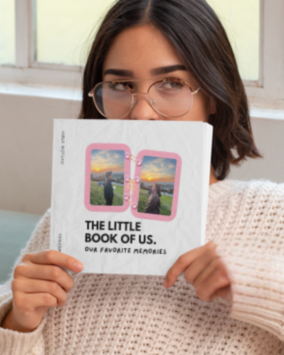 Woman holding a personalized book of memories